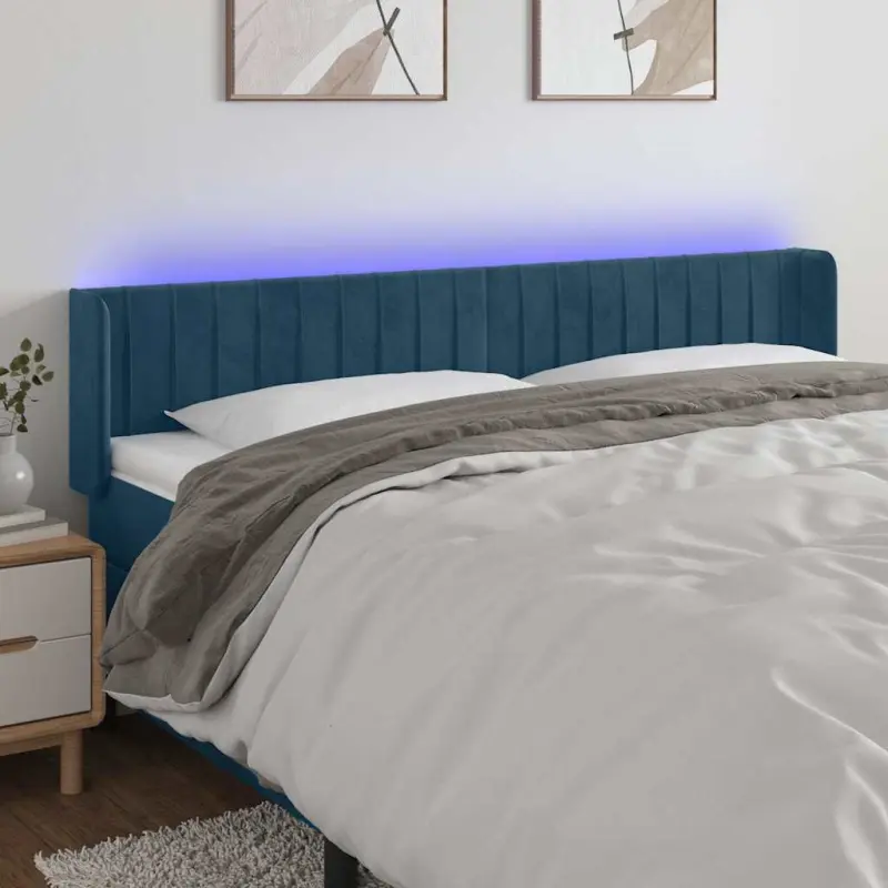 Zagłówek do łóżka z LED ciemnoniebieski 163x16x78/88 cm aksamit