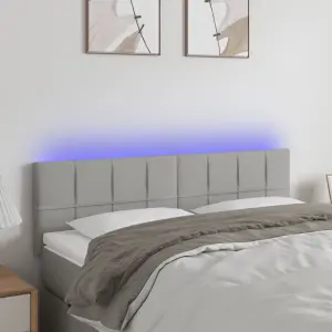 Zagłówek do łóżka z LED, jasnoszary, 144x5x78/88 cm, tkanina