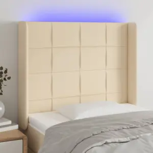 Zagłówek do łóżka z LED, kremowy, 83x16x118/128 cm, tkanina